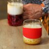 OFFICE S heat resistant glass mug with red silicone wristband 0,4 L