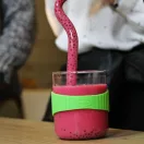 OFFICE S heat resistant glass mug with green silicone wristband 0,4 L