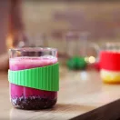 OFFICE S heat resistant glass mug with green silicone wristband 0,4 L
